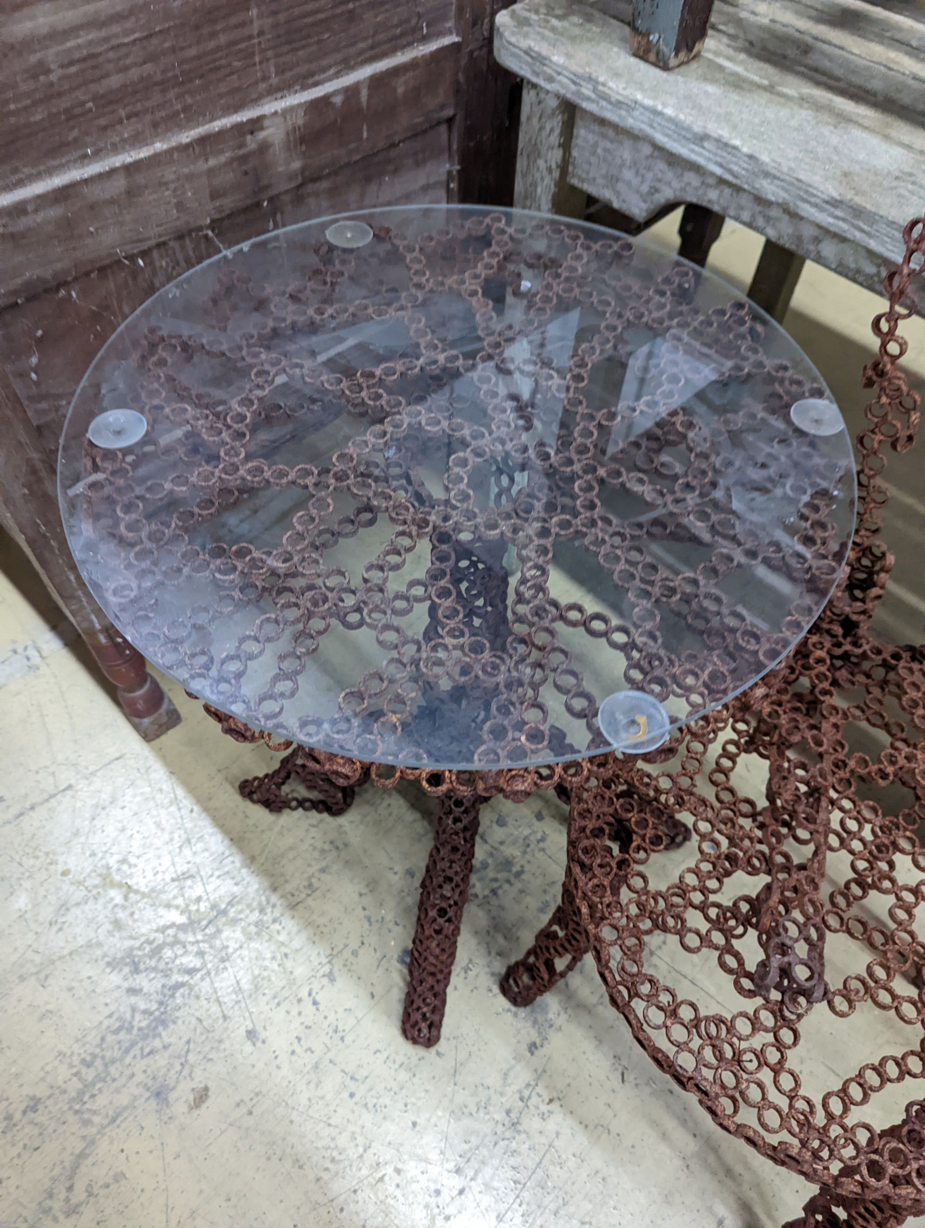 A reclaimed metal table and chair (chair a.f.) table measurements, D-54cm, H-66cm.